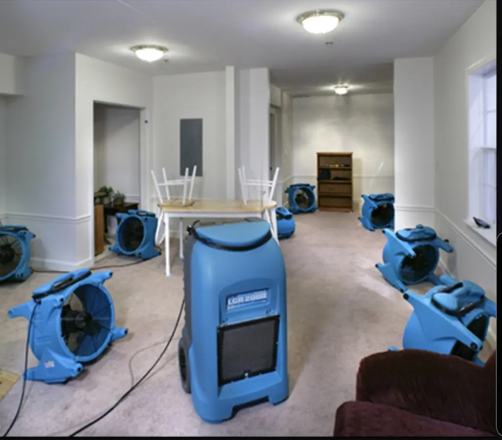 Air movers and dehumidifier setup for Water Damage Restoration in East Fallowfield